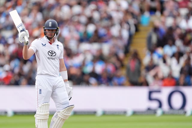 England’s Jamie Smith celebrates hitting a half century
