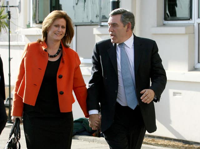 Sarah and Gordon Brown walking hand-in-hand before the Labour Party Conference in Bournemouth in 2007