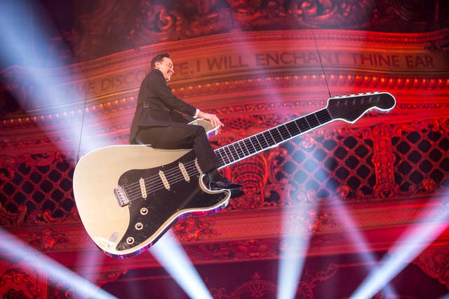 Craig Revel Horwood descends from the roof of the Tower Ballroom in the 2015 Blackpool edition of Strictly Come Dancing. (Image: PA)