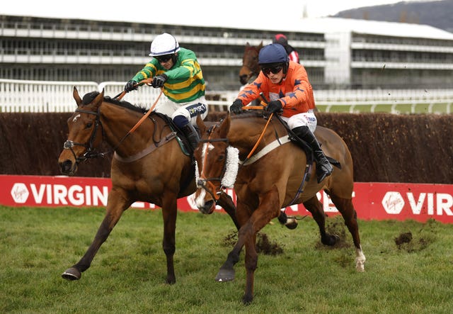 Madara (right) and Harry Cobden knuckle down on the run-in 