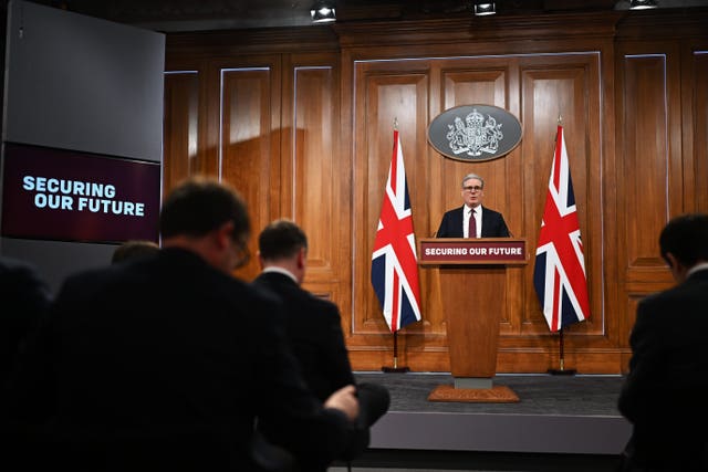 Sir Keir Starmer giving a press conference from the Downing Street briefing room