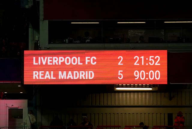 The Anfield scoreboard showing Liverpool 2 Real Madrid 5