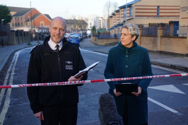 Metropolitan Police Detective Chief Superintendent James Conway and Hackney mayor Caroline Woodley issue a statement near to the scene in Vine Close, Hackney, on Wednesday