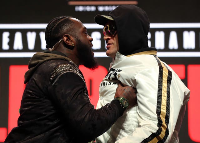 Tyson Fury, left, will take on Deontay Wilder for a third time in October (Bradley Collyer/PA)