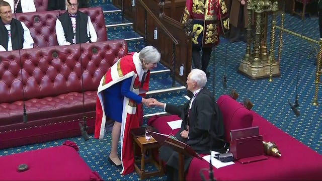 Theresa May shakes hands with Speaker of the House of Lords, Lord McFall