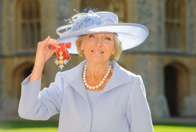 Mary Berry after she became a Commander of the British Empire by the Prince of Wales
