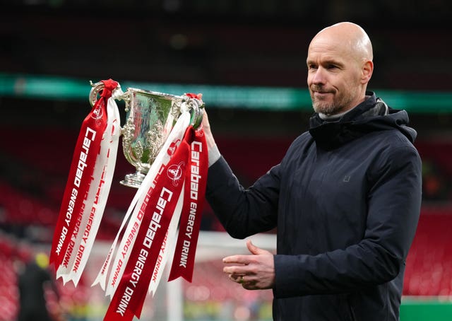 Manchester United manager Erik ten Hag lifts Carabao Cup trophy