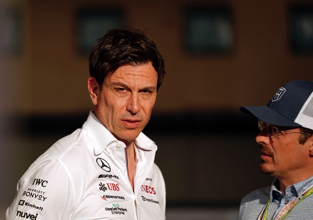 Toto Wolff (left) hopes Hamilton stays on at Mercedes