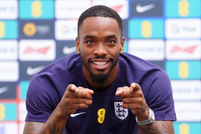 Ivan Toney smiles at a press conference 