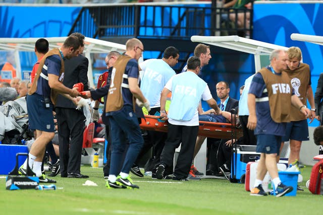 England physio Gary Lewin is carried off