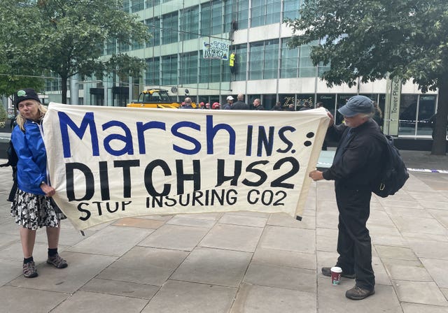 Protesters at the seven-storey Tower Place West building in central London 