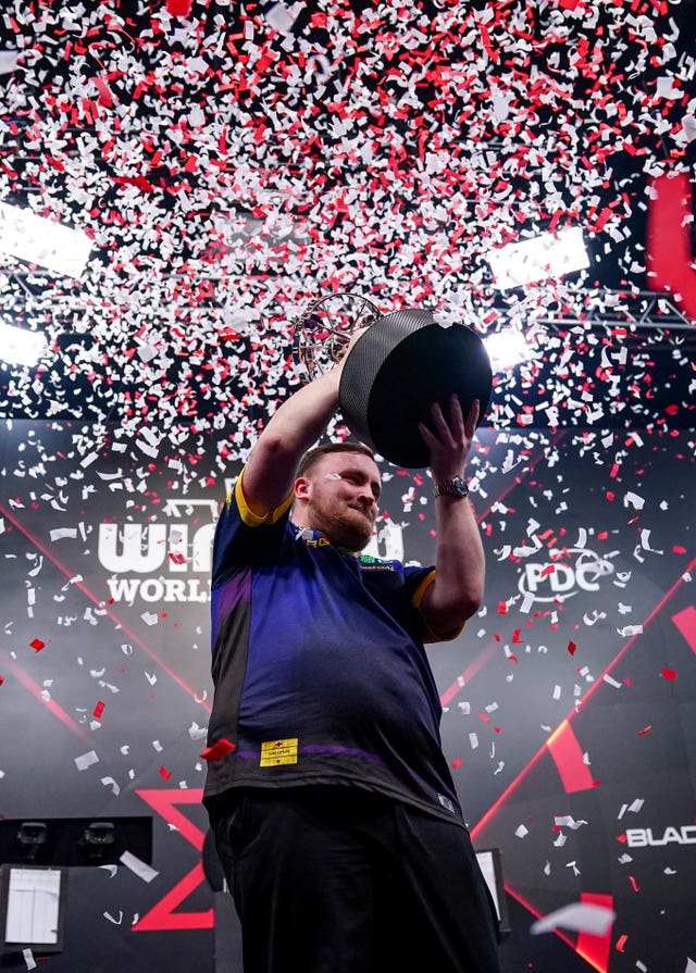 England’s Luke Littler celebrates winning during day four of the Winmau World Masters at Arena MK, Milton Keynes