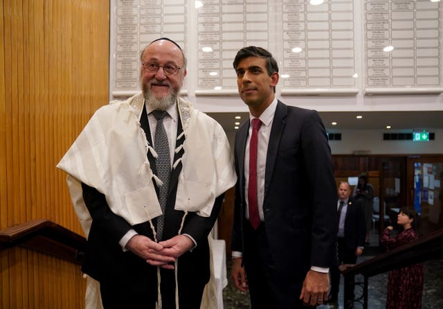 Chief Rabbi Sir Ephraim Mirvis (left) thanked Prime Minister Rishi Sunak for attending the prayer service at a synagogue in north London (Lucy North/PA)