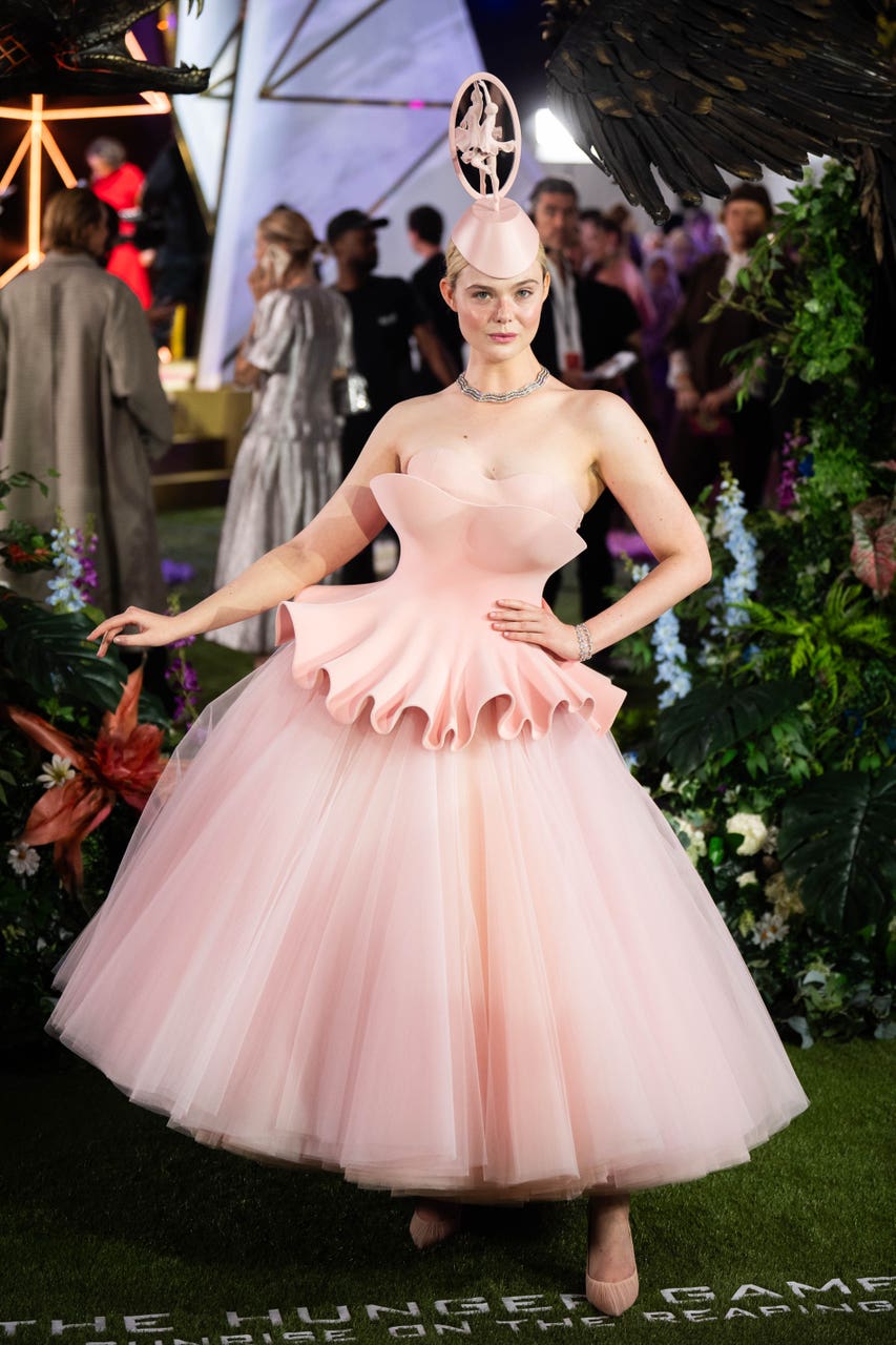 Elle Fanning stuns Hunger Games screening in ballet music box-inspired ...