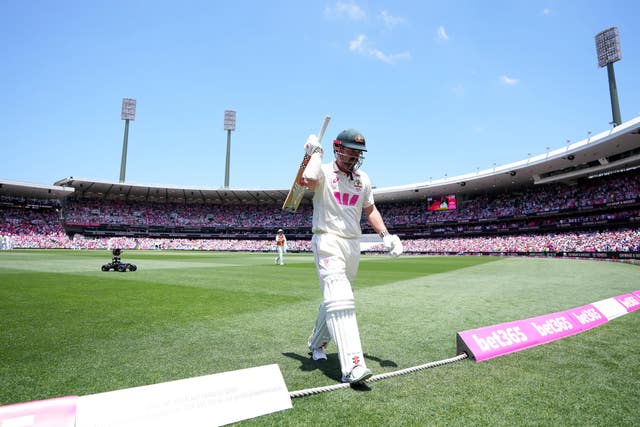 Australia's Travis Head walks off the ground after being dismissed for 163 