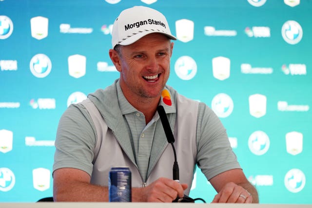 Justin Rose smiles during a press conference