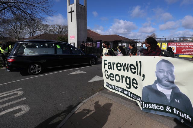 The coffin of George Nkencho arrives at the church