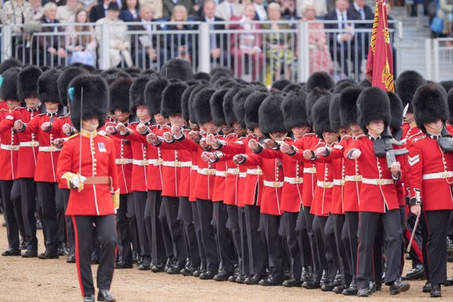 Members of the Welsh Guards march in Horse Guards Parade during the Trooping the Colour ceremony