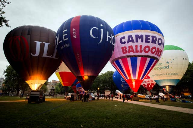 The JLL balloon (left) is seen at the balloon fiesta in 2014 (Ben Birchall/PA)