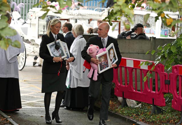 Mourners arrive at St Paul’s Church