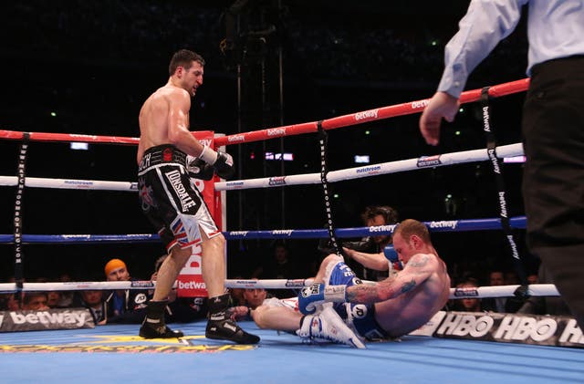 Froch knocks down Groves (Peter Byrne/PA)