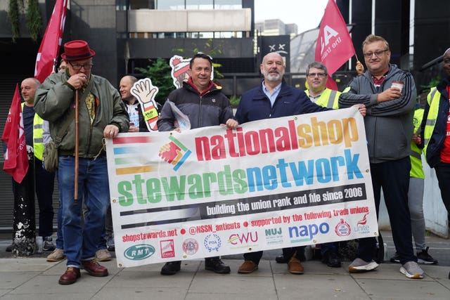 Aslef general secretary Mick Whelan (second right) on a picket line at Euston station in London 