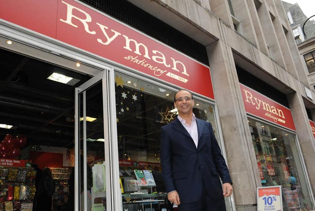 Theo Paphitis outside his Ryman Stationary store on Wardour Street 