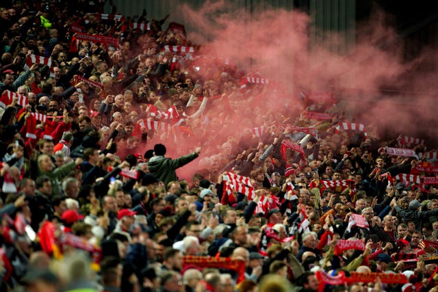 Liverpool fans celebrate victory over Manchester City