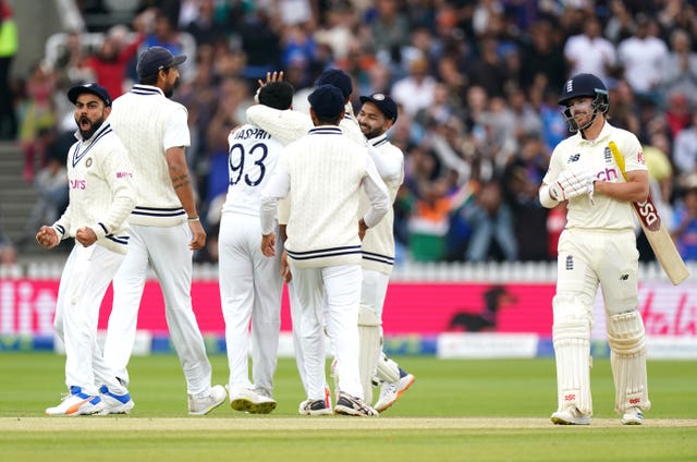 India celebrate the dismissal of Rory Burns for a duck 