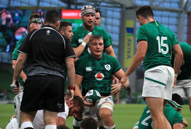 Ireland’s Gavin Coombes, centre, was among the try scorers in Dublin