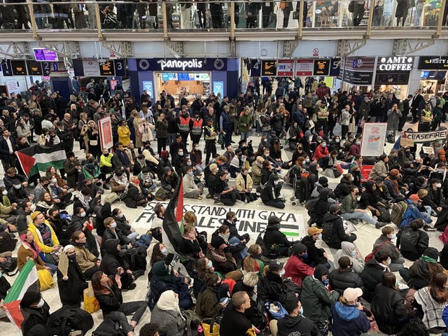 Protesters at a sit-in at Liverpool Street station in London 