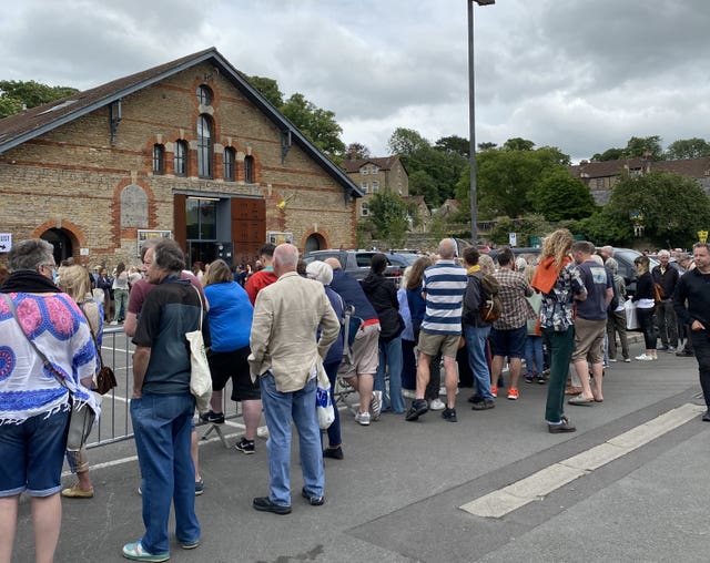 Crowds gather outside the Cheese and Grain in Frome, Somerset, to see Sir Paul McCartney perform on Friday