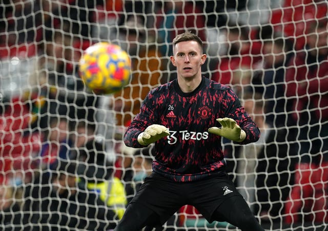 Manchester United goalkeeper Dean Henderson warming up before the Premier League match at Old Trafford, Manchester. Picture date: Tuesday February 15, 2022.
