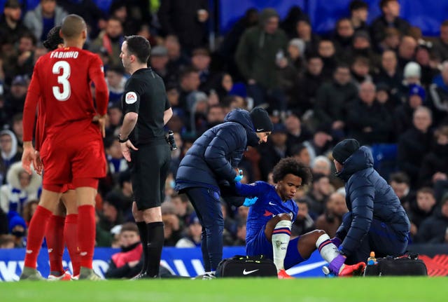 Willian receives treatment for an Achilles injury