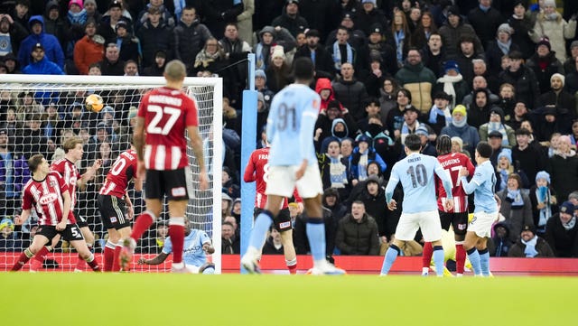 Rico Lewis scored twice for a dominant Manchester City side