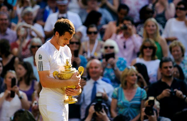 Andy Murray cradles the Wimbledon trophy following a historic Centre Court win in 2013. The 26-year-old Scot became Britain's first Wimbledon men’s singles champion since Fred Perry in 1936 when he defeated world number one Novak Djokovic 6-4 7-5 6-4. Murray again won the tournament in 2016