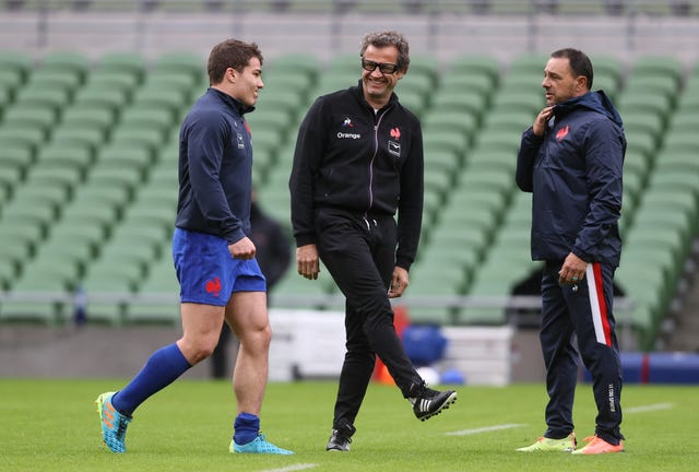 Antoine Dupont, left, has been a key player for France under head coach Fabien Galthie, centre, and team manager Raphael Ibanez, right