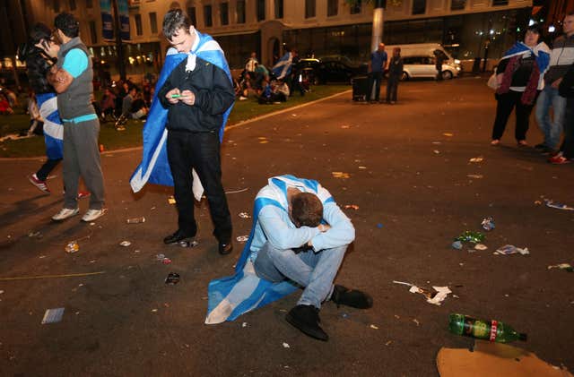 Independence supported sitting on the ground with his head in his hands on the night of the referendum