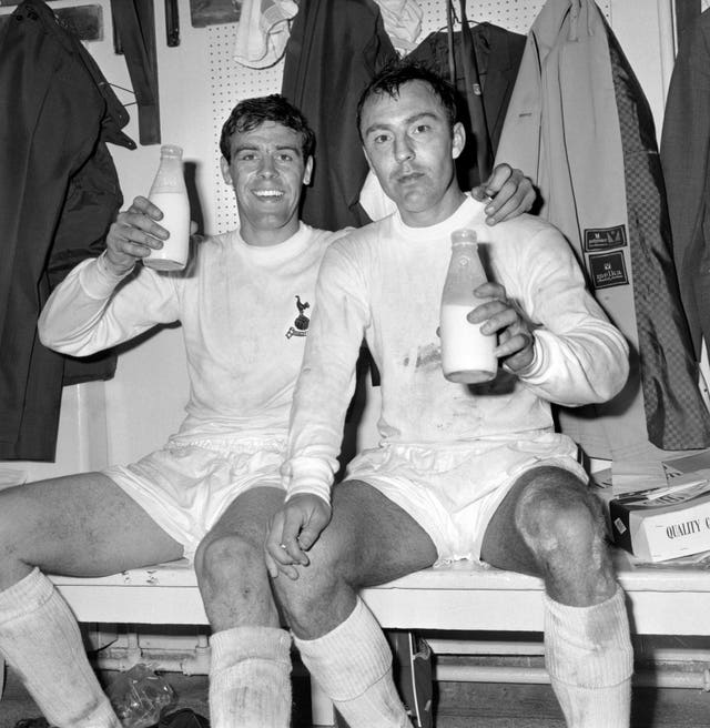 Jimmy Greaves and team-mate Mike England celebrate Spurs’ FA Cup final win over Chelsea