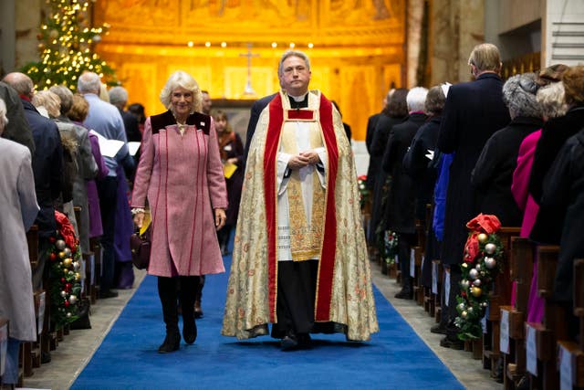 The Duchess pictured leaving the carol service with the Reverend Stephen Dunwoody, Chaplain to the Household Division. Heathcliff O’Malley/Daily Telegraph