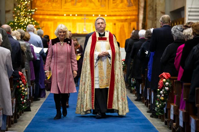 The Duchess pictured leaving the carol service with the Reverend Stephen Dunwoody, Chaplain to the Household Division. Heathcliff O’Malley/Daily Telegraph