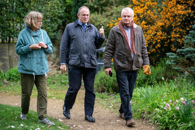 Liberal Democrat leader Sir Ed Davey with Cllr Angela Conder and Cllr Jeremy Hilton during a visit to Hillfield Gardens in Gloucester (Ben Birchall/PA)