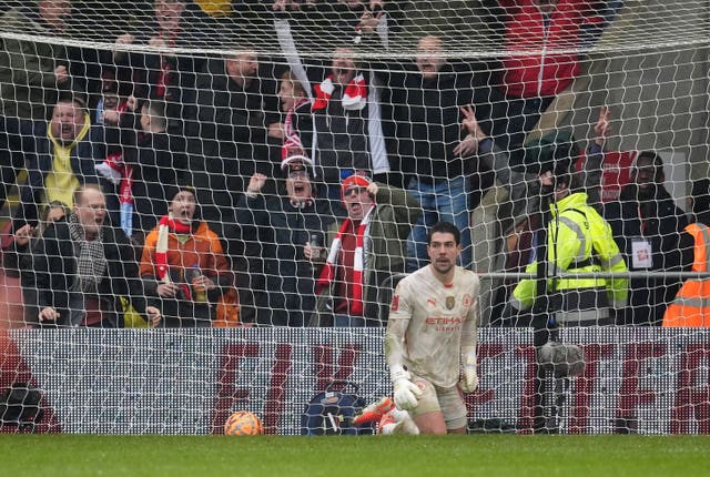 Manchester City goalkeeper Stefan Ortega looks on after turning in an effort from Leyton Orient’s Jamie Donley, the ball nested in the back of the net 