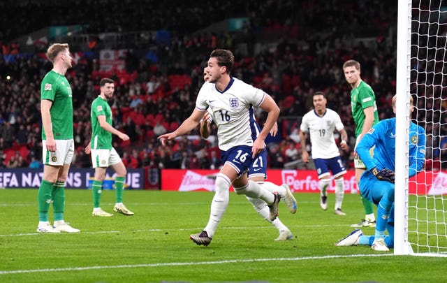 Taylor Harwood-Bellis runs off to celebrate scoring for England