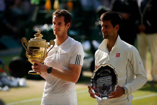 Andy Murray, left, and runner-up Novak Djokovic with their trophies after the 2013 Wimbledon final