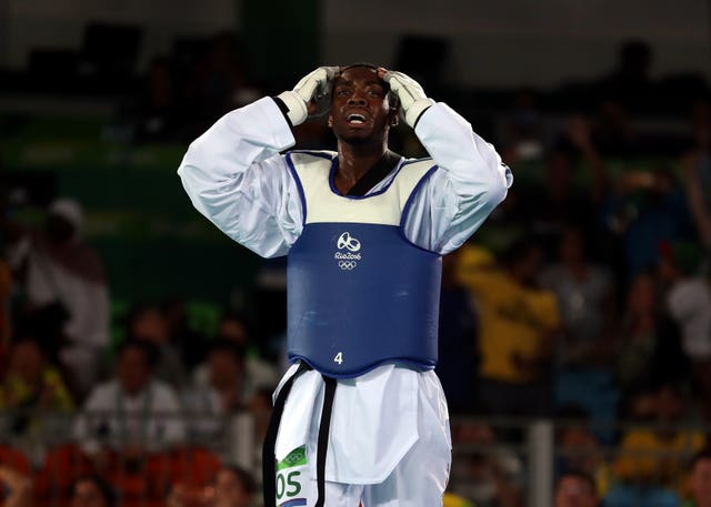 Great Britain’s Lutalo Muhammad looks dejected following defeat to Ivory Coast's Cheick Sallah Cisse during the men’s 80kg taekwondo final at the Rio Olympic Games 2016 – Day Fourteen