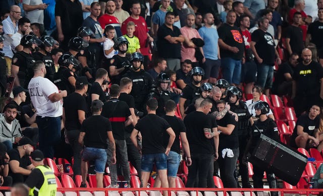 Police in the stands with Serbia fans