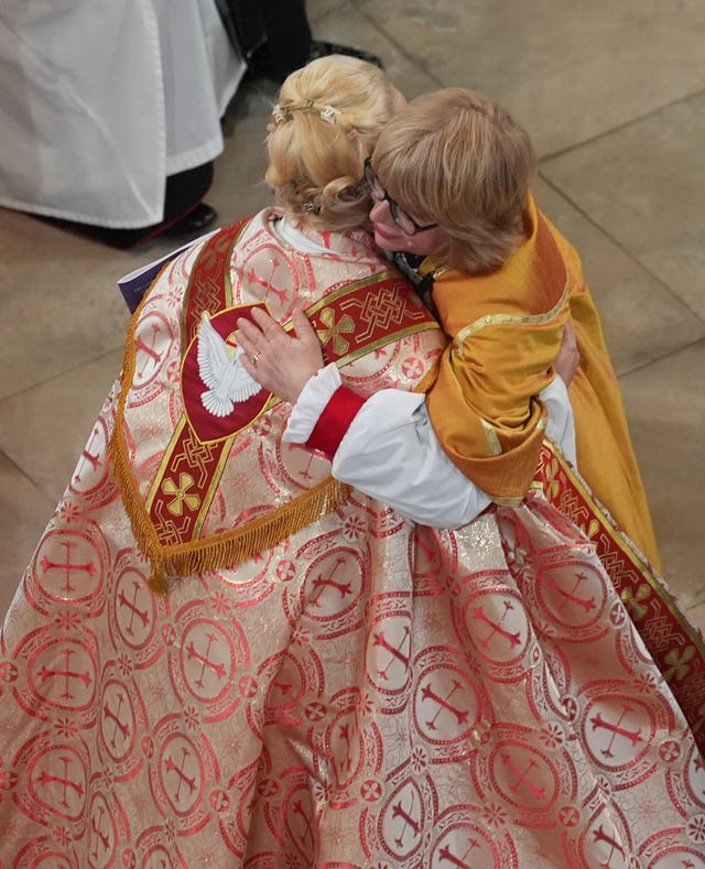 Dame Sarah embraces the Rt Rev Paulina Hlawiczka-Trotman,