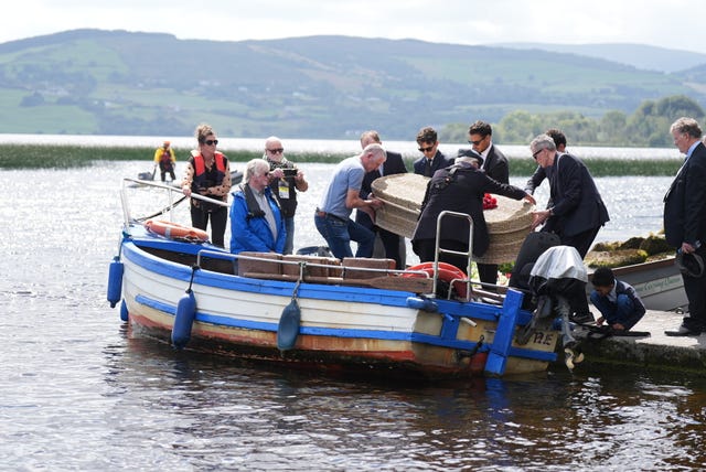 The wicker coffin was taken by boat across Lough Derg to Holy Island