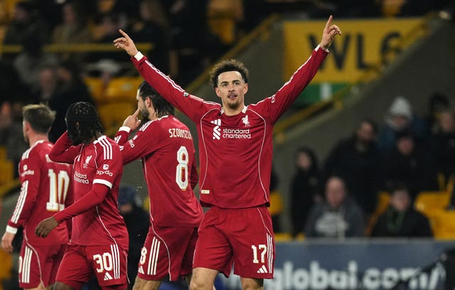 Curtis Jones celebrates